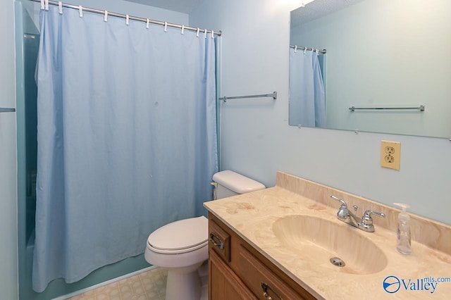 full bath featuring toilet and vanity