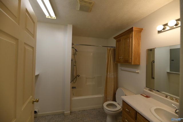 full bathroom featuring vanity, shower / bathtub combination with curtain, a textured ceiling, and toilet