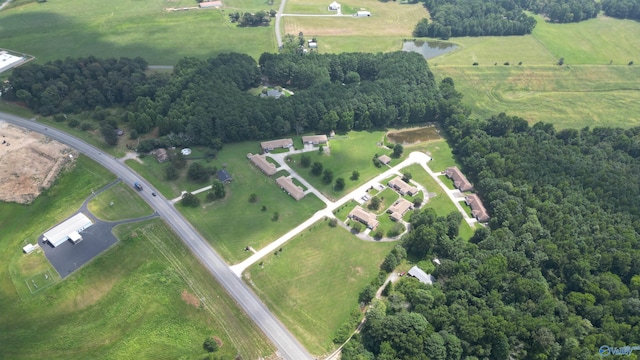 aerial view featuring a water view and a rural view