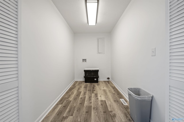 615 County Road 40, Centre, AL 35960 - clothes washing area with wood finished floors, baseboards, visible vents, laundry area, and washer hookup