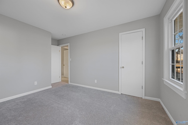 view of carpeted spare room