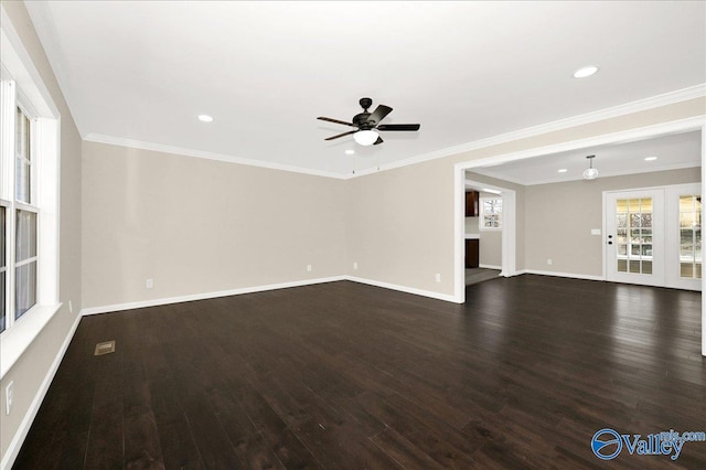 unfurnished living room with dark wood-style floors, recessed lighting, baseboards, and ornamental molding