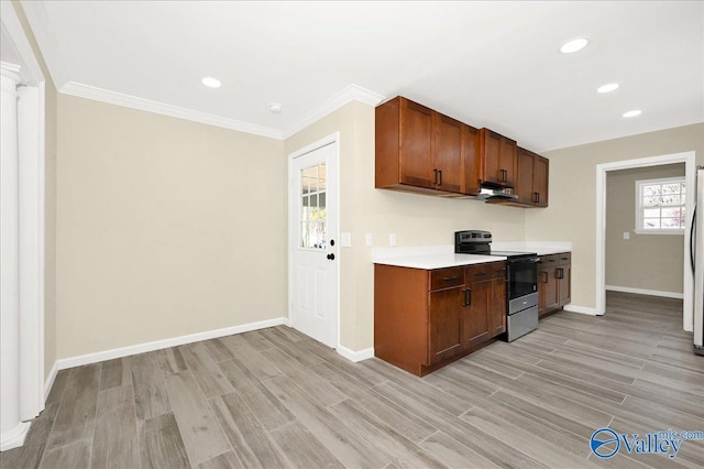 kitchen featuring light countertops, electric range, light wood-style flooring, and baseboards