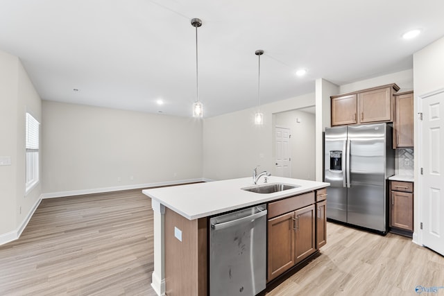 6228 Pisgah Dr NW, Huntsville, AL 35810 - kitchen with stainless steel appliances, a sink, light wood-style floors, light countertops, and recessed lighting