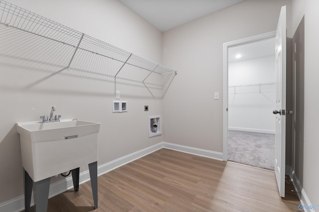 6228 Pisgah Dr NW, Huntsville, AL 35810 - washroom with washer hookup, electric dryer hookup, wood finished floors, and baseboards
