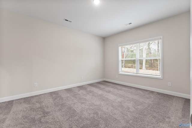 6228 Pisgah Dr NW, Huntsville, AL 35810 - empty room with baseboards and carpet floors