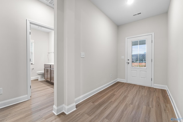 6228 Pisgah Dr NW, Huntsville, AL 35810 - doorway with light wood-style flooring and baseboards