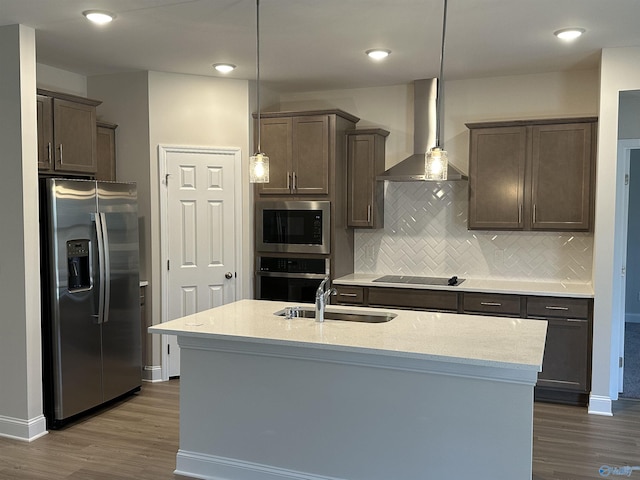 6228 Pisgah Dr NW, Huntsville, AL 35810 - kitchen with stainless steel appliances, wall chimney exhaust hood, dark wood-style floors, backsplash, and recessed lighting