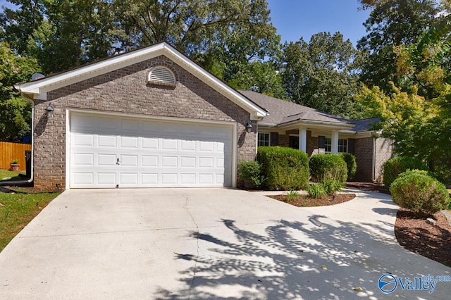 single story home featuring a garage