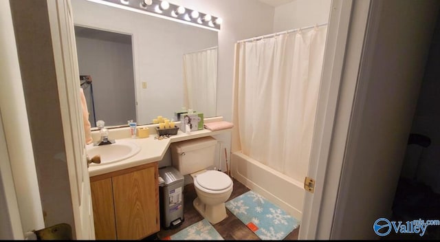 full bathroom featuring vanity, toilet, and shower / bath combo with shower curtain