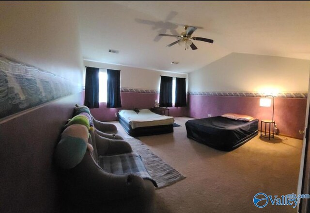 carpeted bedroom featuring ceiling fan and lofted ceiling