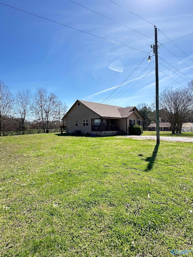 exterior space with a yard