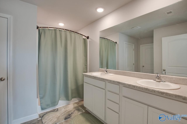 178 Meadow Ridge Dr, Hazel Green, AL 35750 - full bathroom featuring a shower with shower curtain, double vanity, and a sink