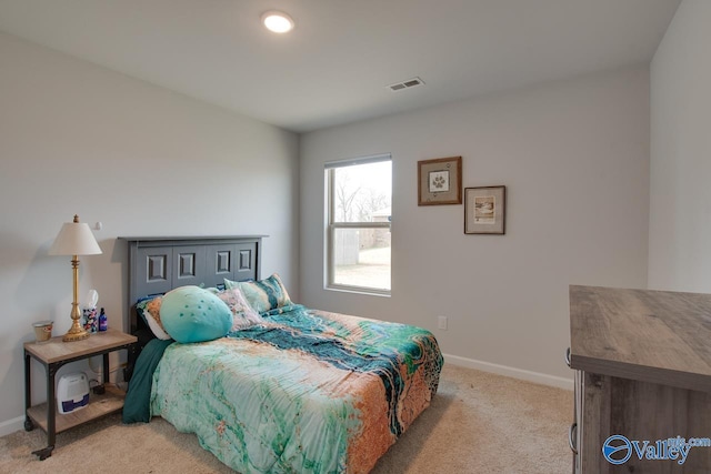 178 Meadow Ridge Dr, Hazel Green, AL 35750 - bedroom with baseboards, visible vents, and light carpet