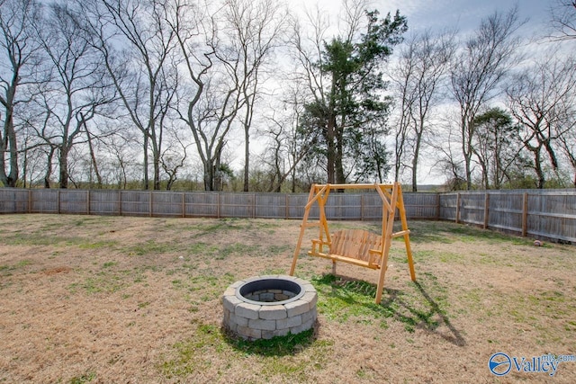 178 Meadow Ridge Dr, Hazel Green, AL 35750 - view of yard with an outdoor fire pit, a playground, and a fenced backyard