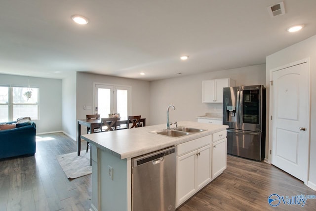 178 Meadow Ridge Dr, Hazel Green, AL 35750 - kitchen featuring visible vents, dark wood finished floors, an island with sink, appliances with stainless steel finishes, and a sink