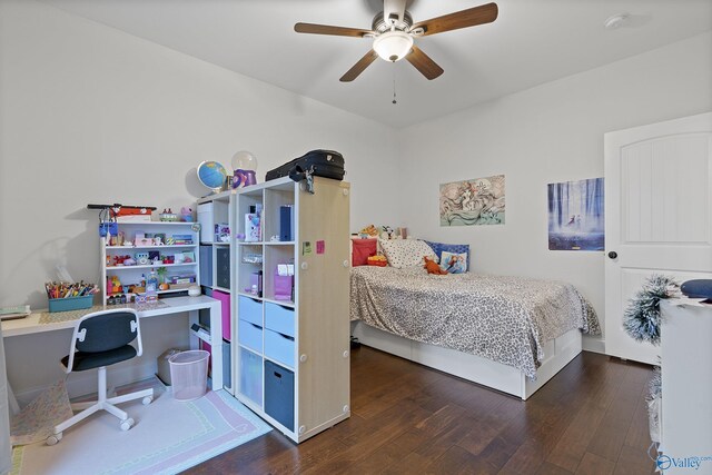 bedroom featuring ceiling fan and dark hardwood / wood-style floors