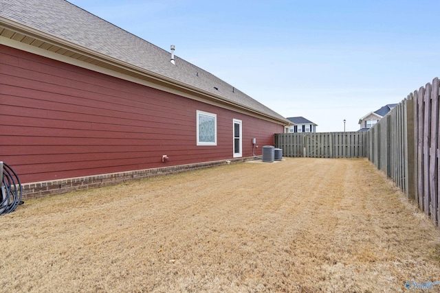 view of yard featuring central AC unit