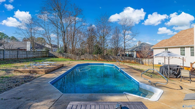 view of swimming pool featuring a fenced in pool, a fenced backyard, a gazebo, a patio area, and a grill