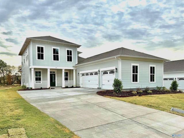 105 Kite Cir, Madison, AL 35756 - view of front of property with a porch, an attached garage, a front lawn, and driveway