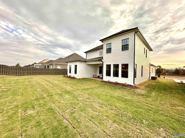 105 Kite Cir, Madison, AL 35756 - rear view of property with central air condition unit and a patio area