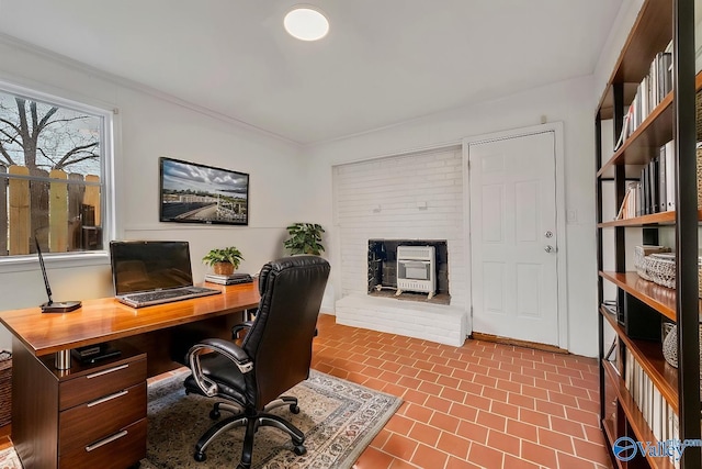 office space with brick floor