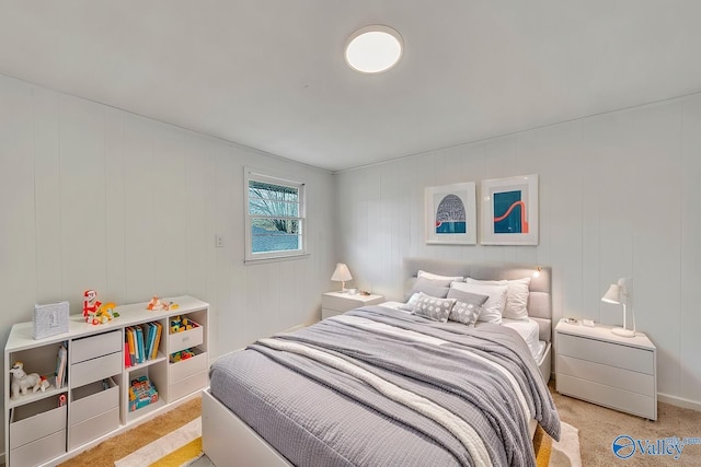 bedroom with light colored carpet