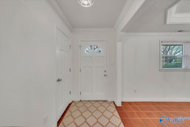 entryway featuring crown molding, visible vents, and a textured ceiling