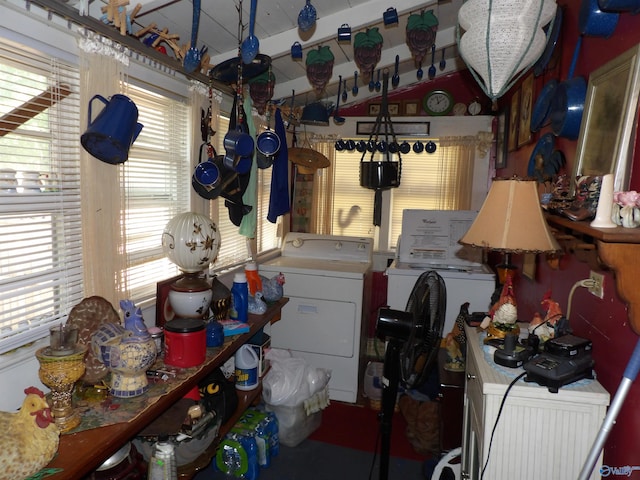 washroom featuring washing machine and clothes dryer