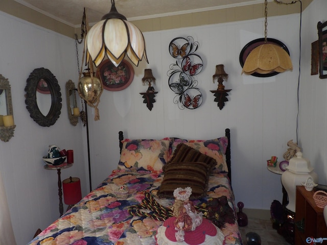 bedroom featuring crown molding