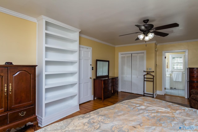 bedroom featuring wood-type flooring, ceiling fan, connected bathroom, and crown molding