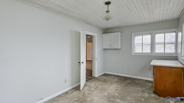 clothes washing area with light colored carpet