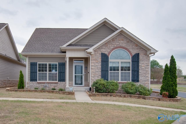 view of front of property with a front lawn