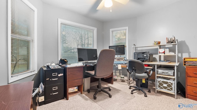 office area featuring ceiling fan and light colored carpet