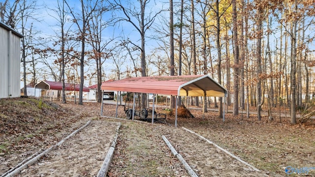 view of yard with a carport