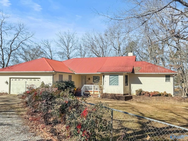 ranch-style home featuring a garage