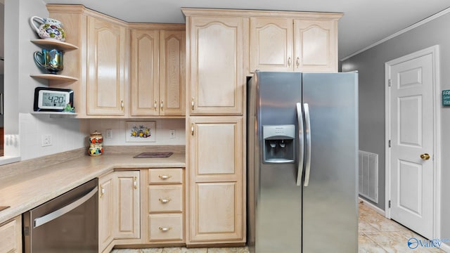 kitchen featuring light brown cabinets, light tile patterned floors, ornamental molding, decorative backsplash, and stainless steel appliances