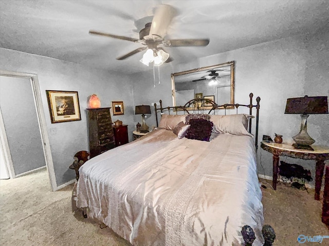 bedroom featuring carpet floors and a ceiling fan