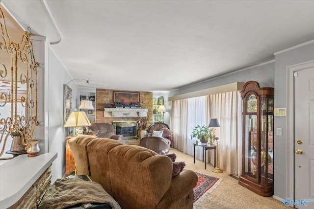 living room with a large fireplace, ornamental molding, and light carpet