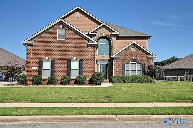 front facade with a front lawn