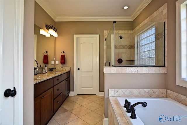 bathroom featuring tile patterned floors, vanity, ornamental molding, and independent shower and bath