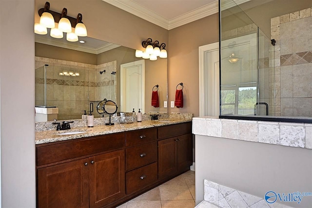 bathroom featuring a shower with door, vanity, ornamental molding, and tile patterned flooring