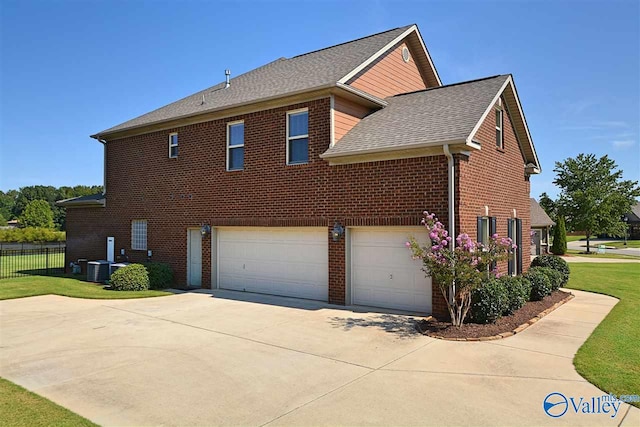 view of home's exterior with a garage