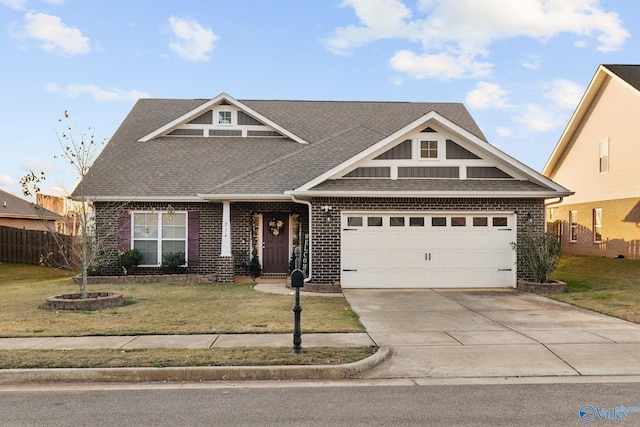 craftsman inspired home with a front lawn and a garage