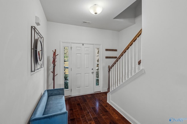 foyer with dark wood-type flooring