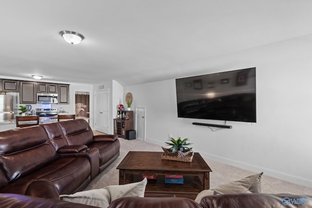 living room featuring light carpet