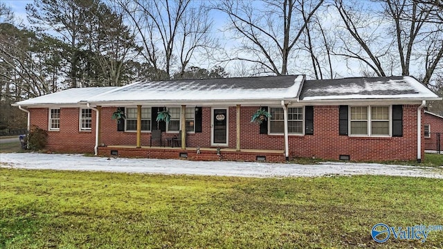 single story home with a porch and a front yard