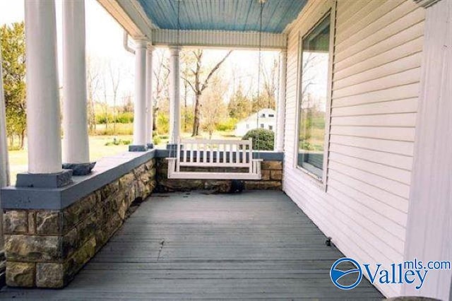 deck featuring covered porch