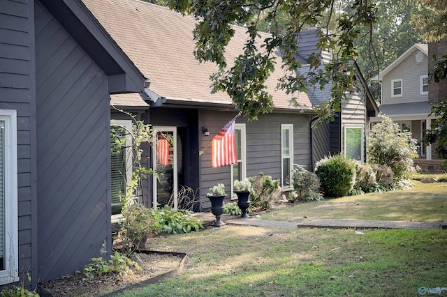 exterior space with a front yard