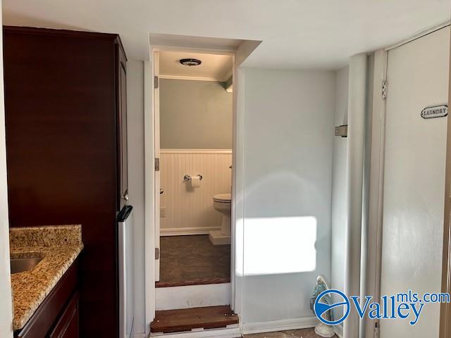 bathroom with vanity and toilet